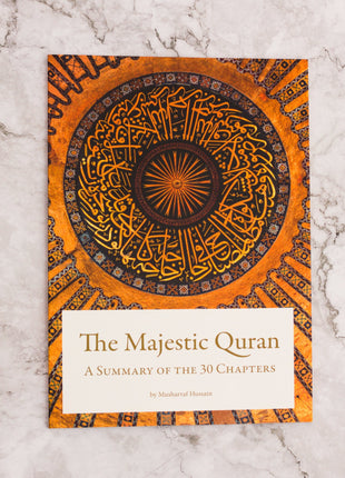 The Majestic Quran: A Summary of the 30 Chapters by Musharraf Hussain